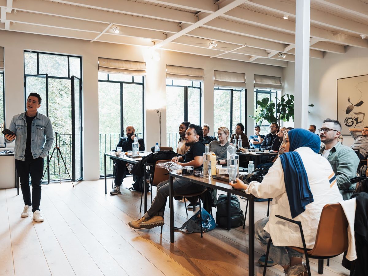 Adults seated in a bright room during a group education session