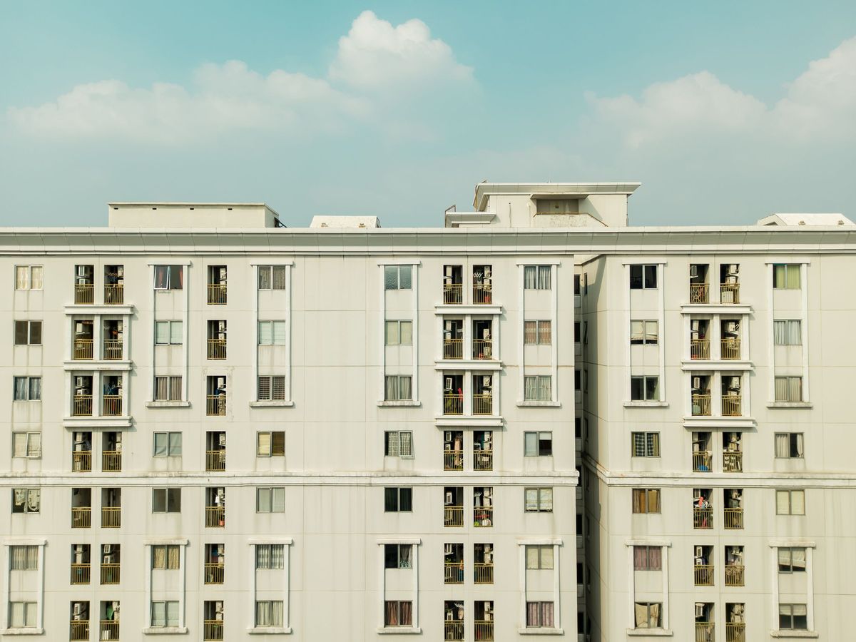 The exterior facade of a multi-storey residential apartment building